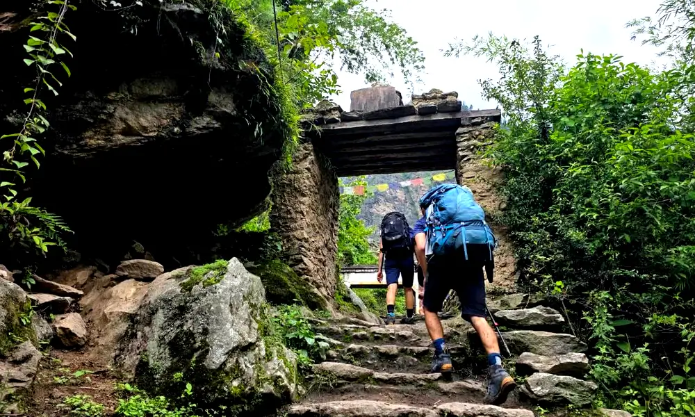 Trekkers heading toward Deng Village during the Manaslu Circuit Trek